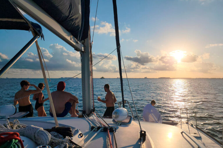 People on deck sunset